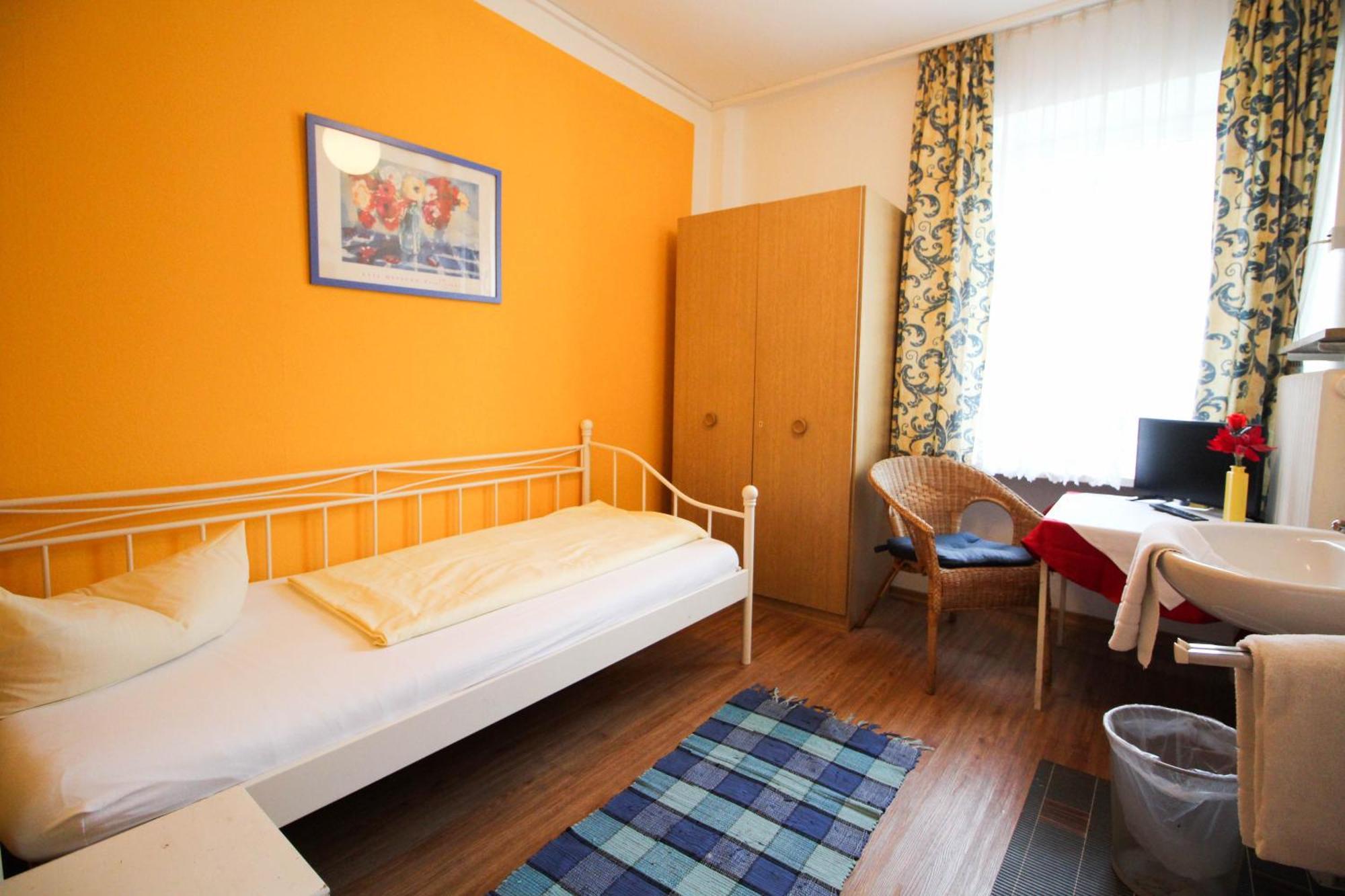Hotel Pension Am Hauptbahnhof Мюнхен Номер фото